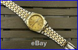 80's vintage watch SEIKO SQ sports 100 Ref. 8229-8010 gold and SS 38mm royal oak