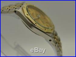 80's vintage watch SEIKO SQ sports 100 Ref. 8229-8010 gold and SS 38mm royal oak