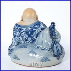 Antique Japanese Blue and White Porcelain Figurine of Seated Hotei Early 20th c