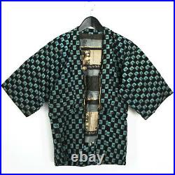 Vintage Japanese ikat boro cloth padded kimono jacket with scenic printed lining